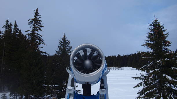 Snowmaking machine on a ski slope in the French alps