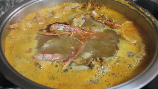 boiling shrimp shells and fish