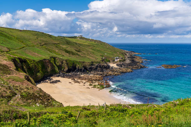 istock Celtic Sea Coast and cliffs near Portheras Cove, Cornwall, England, UK 1901805672