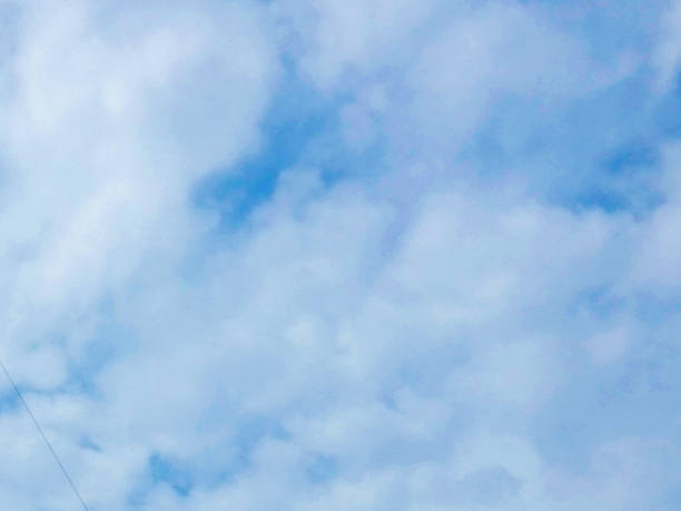 istock Beautiful blue sky dotted with white clouds 1901823198