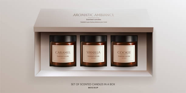 A realistic 3D vector mockup of scented vanilla candles in brown glass jars in a open packaging box, front view. The design offers an ideal template for advertising aromatherapy products. Not AI. A realistic 3D vector mockup of scented vanilla candles in brown glass jars in a open packaging box, front view. The design offers an ideal template for advertising aromatherapy products. Not AI. candle package mockup stock illustrations
