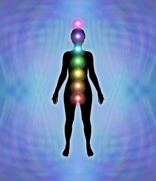 istock Silhouette with Seven Major Chakras blue matrix background 1901868195