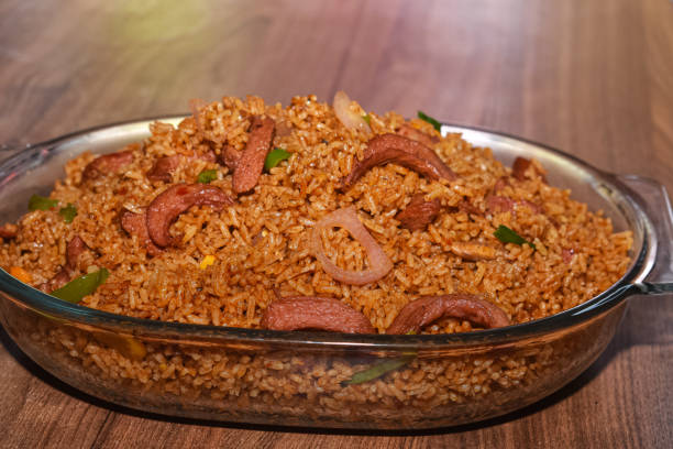 istock Jollof rice with vegetables and sausage 1901875008