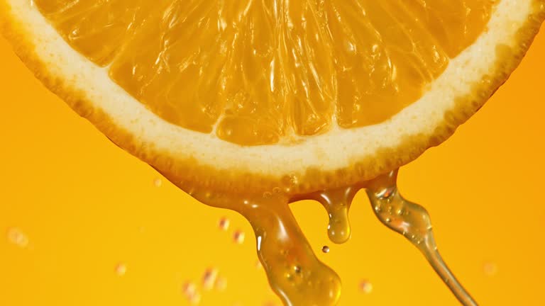 Super Slow Motion Shot of Fresh Orange Juice