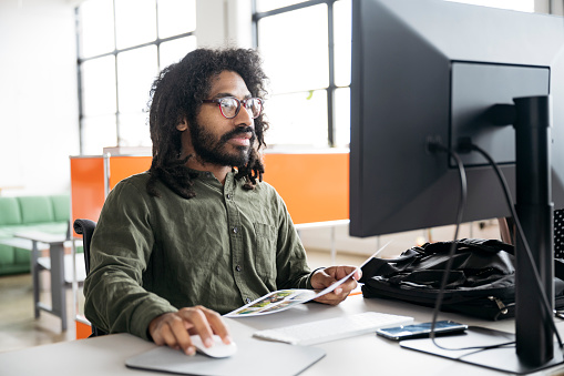 Bearded Creative Working At Desktop Computer Stock Photo - Download ...