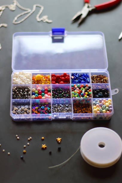 jewelry making supplies - chain storage room equipment gold chain photos et images de collection