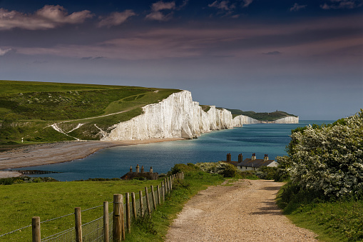 The Seven Sisters of Sussex at Cuckmere Haven under a red sky in East Sussex England UK