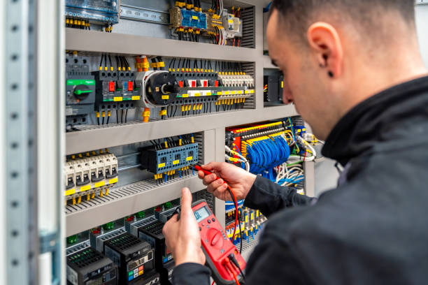 istock Close-up of an engineer repairing an electrical system panel 1901968366