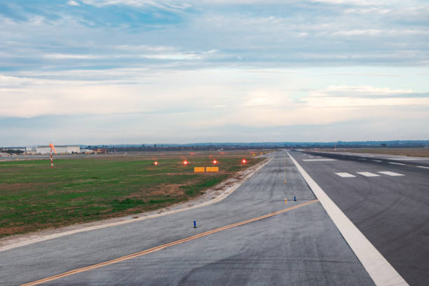 istock Runway in the airport with traffic lights 1902005439