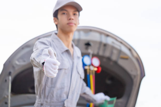 Work tools by a car engine