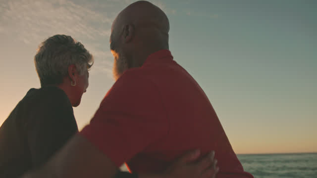 Active Mature African-American Couple Enjoying Retirement and Each Other’s Company at the Beach.