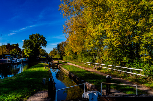 Stratford Canal Nr. Stratford upon Avon England UK. View from the towpath. Autumn.  No people in picture.