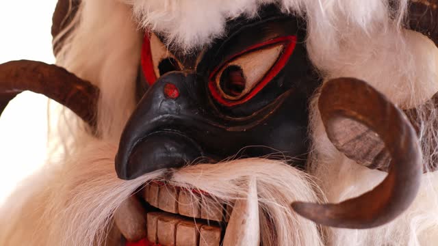 Krampus mask made of animal skin, horns, fangs for the December procession, Austrian traditional ceremony