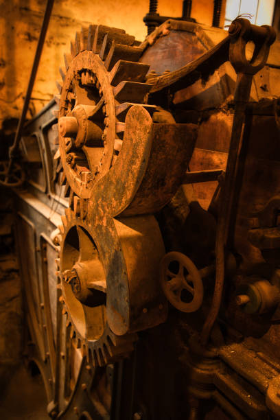 istock Two wooden gears of an old machine 1902141599