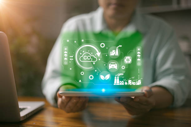 istock Carbon dioxide emission in industry net zero carbon concept. woman hand with net zero icon. Sustainable energy with co2 affects global warming. Carbon neutrality goal Greenhouse gas emissions 2050 1902164091
