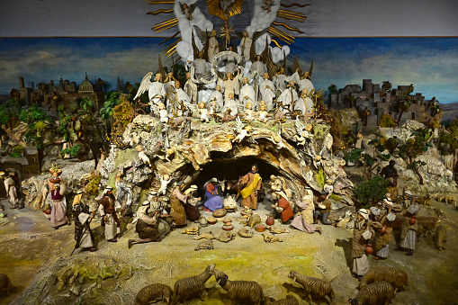 Christkindl Steyr Austria - 12 27 2023 - Pöttmesser nativity scene in the Christkindl rectory - With 58 square meters and over 700 beautifully carved and dressed figures by the South Tyrolean Ferdinand Pöttmesser (1895 - 1977), the Pöttmesser nativity scene is one of the largest nativity scenes in the world. The landscape mountain was subsequently lovingly designed by Josef Seidl from Steyr.