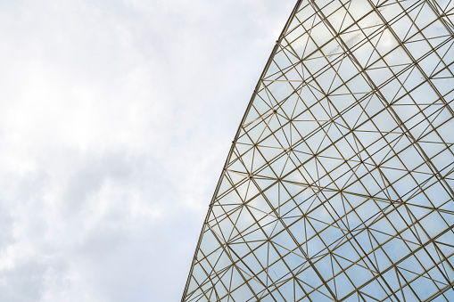 Low angle vision in a corner of modern glass architecture