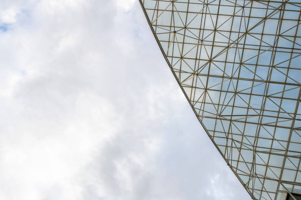 istock Low angle vision in a corner of modern glass architecture 1902200124