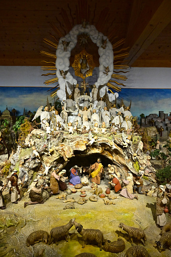 Christkindl Steyr Austria - 12 27 2023 - Pöttmesser nativity scene in the Christkindl rectory - With 58 square meters and over 700 beautifully carved and dressed figures by the South Tyrolean Ferdinand Pöttmesser (1895 - 1977), the Pöttmesser nativity scene is one of the largest nativity scenes in the world. The landscape mountain was subsequently lovingly designed by Josef Seidl from Steyr.