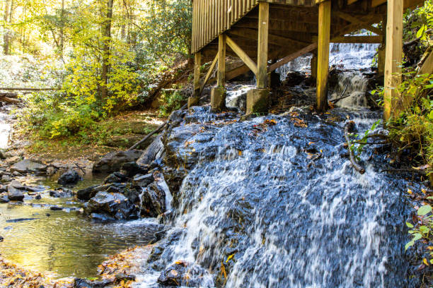 istock Cascading Creek Under Wooden Deck 1902214619