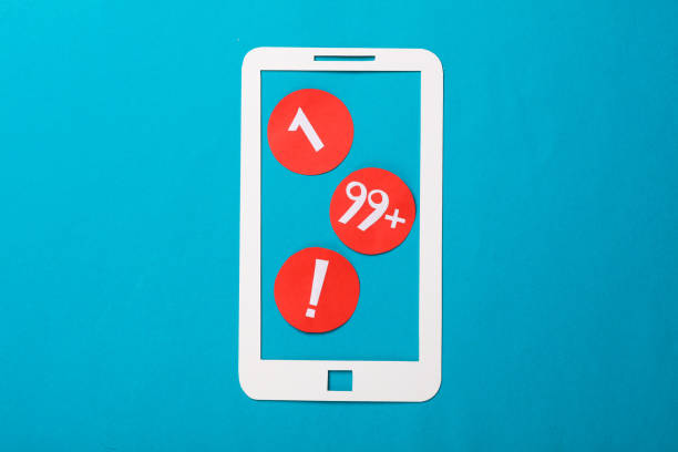 Paper-cut smartphone and notification icons on a blue background