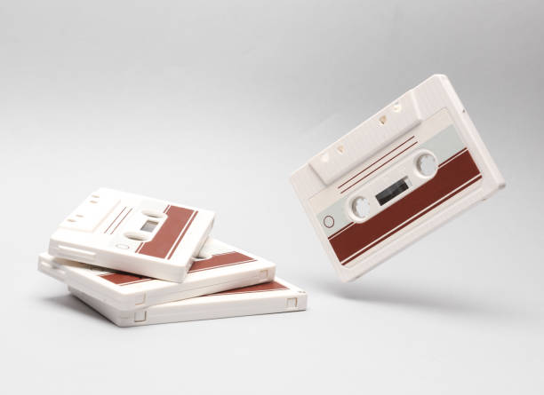 istock Retro audio cassettes levitating on white background. Minimalism 1902239514