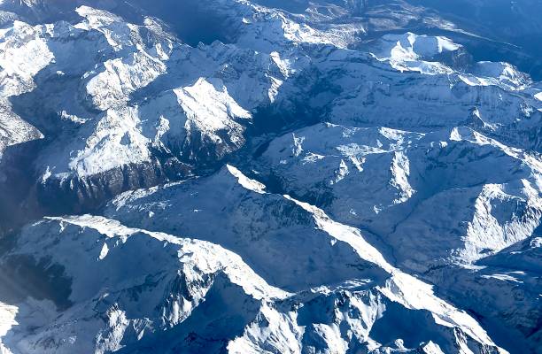 istock Aerial view of snow- covered mountains 1902266592