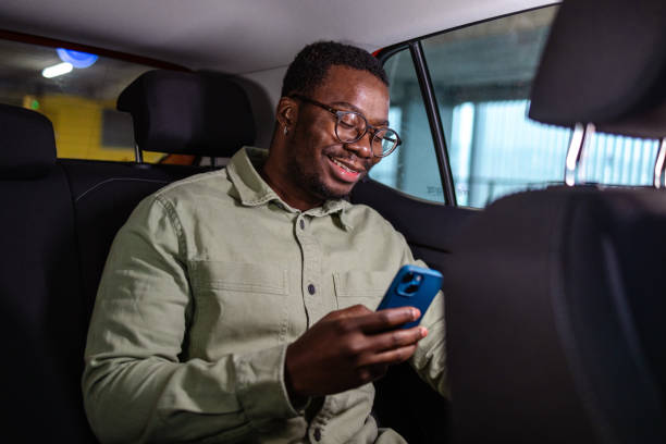 istock A male African-American passenger traveling by cab 1902321871