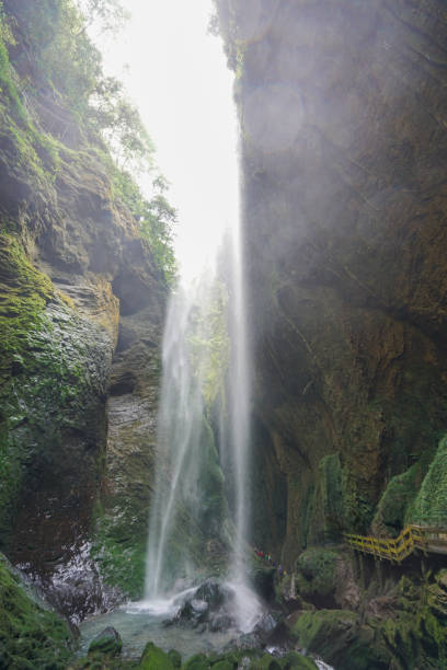istock Waterfalls in the canyon fall from the sky. Like a silver-white chain. 1902361230