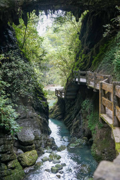 istock There is a tourist trail and a pool between two large rocks. 1902365028