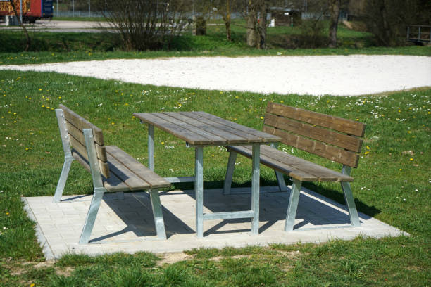 istock Benches and chairs at tables invite you to relax 1902377987