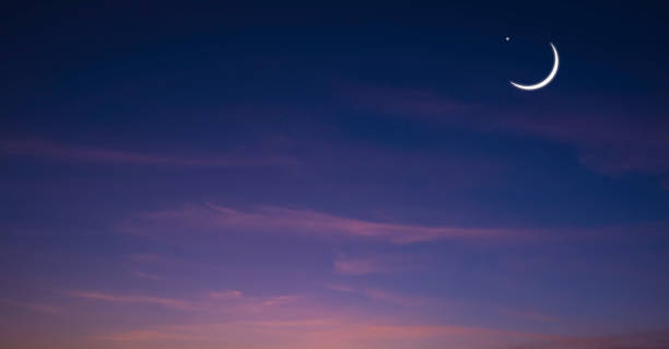 istock Crescent moon and star on dark blue twilight sky, Ramadan night sky background design with free space for editing text 1902382427