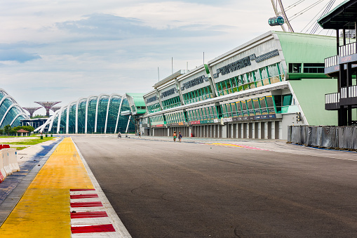 The start and finish straight and pit lane of the Marina Bay Street Circuit. When not used for motor races, the venue is a public access park in the city.