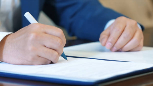 istock Business man signing a contract. 1902484453