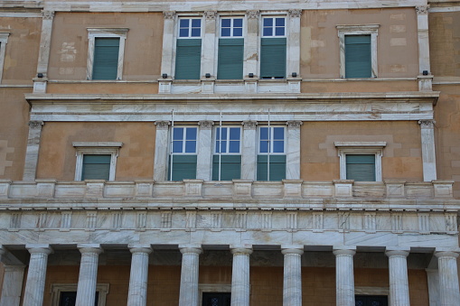 Rome, Italy, January 16 -- The facade and main door of the Borghese Gallery in the Villa Borghese park, in the green heart of Rome, near the Pincio Gardens. The Italian State Museum of the Borghese Gallery is famous for the presence inside it of priceless artistic treasures, with works by Canova, Caravaggio, Bernini, Titian and Raphael, among others. The neoclassical palace was built in 1607 by Scipione Borghese, cardinal and nephew of Pope Paul V. Image in High Definition format.