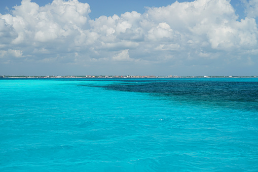 landscape of tropical sea with white cloud and blue sky