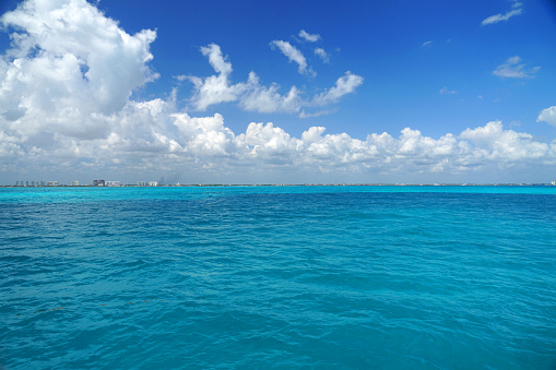 landscape of tropical sea with white cloud and blue sky