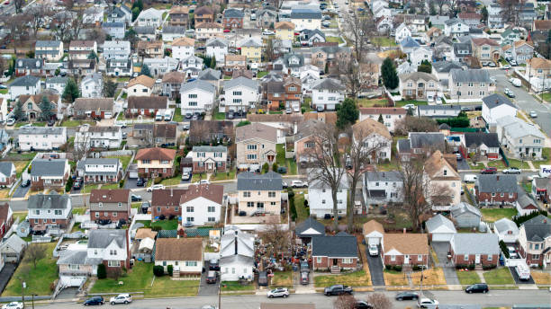 istock Homes in a row crowed Middle Class neighborhood 1902658179