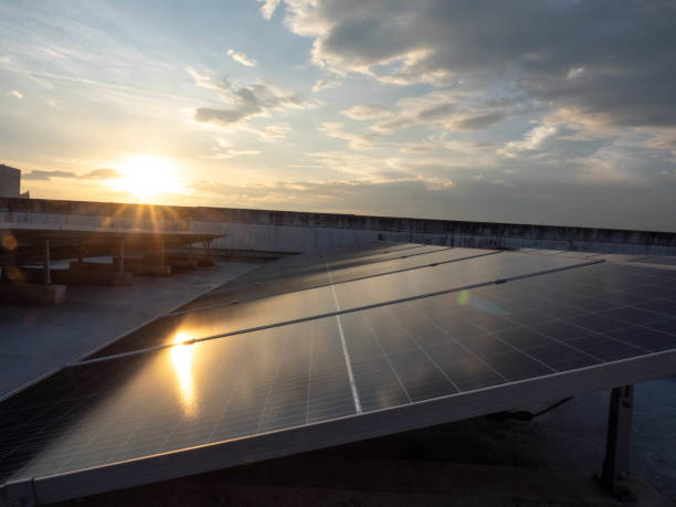 istock Sunset sunrise blue sky cloudy white background wallpaper copy space empty solar cell technology energy power alternative industry green ecology nature future roof global station farm business house 1902685966
