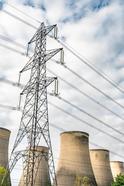 istock Power plant with cooling towers 1902722337