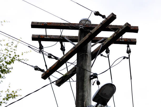 Closeup old electricity wooden pole, full frame horizontal composition