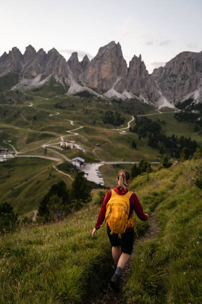 istock Woman hiking outdoors on the Dolomites in summer 1902736813