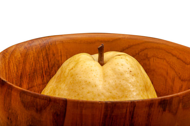 A ripe pear in a bowl