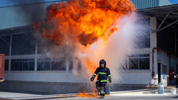 istock Fire flame in steel bucket for demonstrate to extinguish fire 1902782214