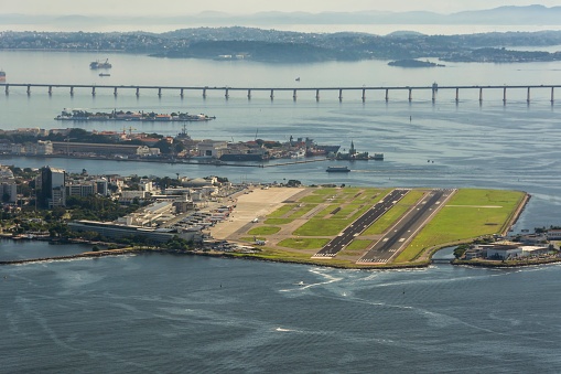 Alberto Santos Dumont Airport. Rio de janeiro Brazil. In the background, the naval base on Snake Island, Fiscal island and the Rio Niterói bridge.