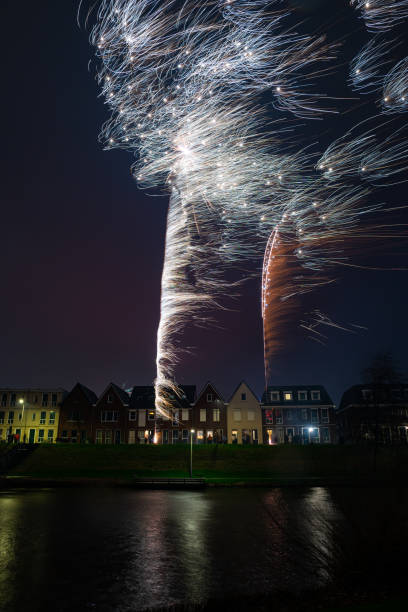 Set off decorative fireworks are moved in the air by strong winds and create special effects.