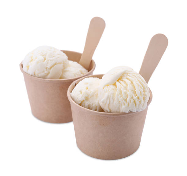istock Delicious vanilla ice cream in paper cups isolated on white 1902939085