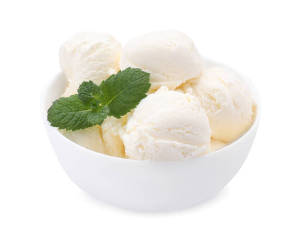 istock Delicious vanilla ice cream and mint in bowl isolated on white 1902939569
