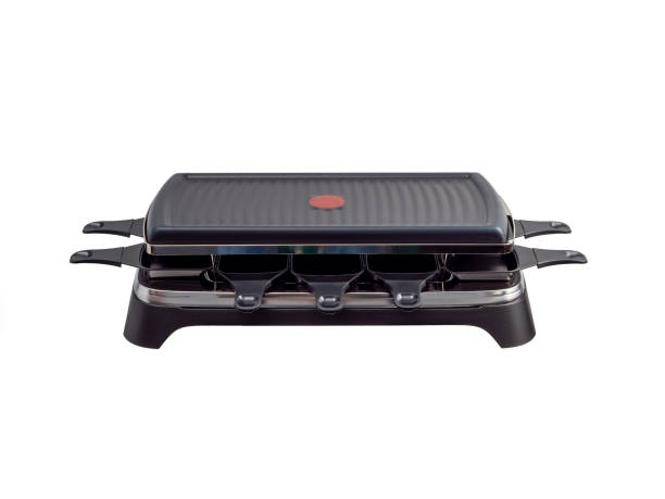 istock Raclette and grill isolated on white background. 1902955470