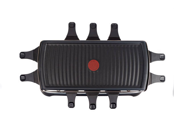 istock Raclette and grill isolated on white background. 1902956491